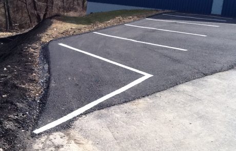 parking spaces repaved and lines painted